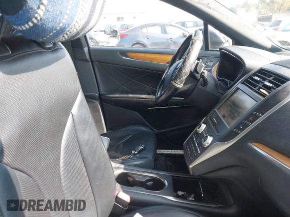 2015 Lincoln MKC with VIN 5LMCJ2A93FUJ24373, listed as a IAAI auction lot 40638009 with 127,336 mi miles. Bid and sale history available at carsss.com. Image 5.