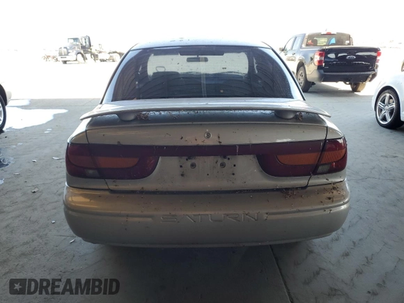 2000 Saturn SL with VIN 1G8ZK5275YZ269895, listed as a Copart auction lot 63102485 with Not provided miles and Clean title. Bid and sale history available at DreamBid. Image 6.