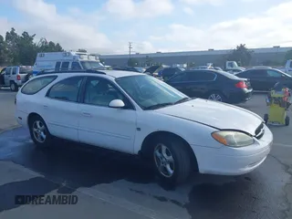 2003 Ford Taurus SE z VIN 1FAFP58SX3A245997, wystawiony jako IAAI lot #42520332 z przebiegiem 140 937 mil mil oraz . Historia ofert i sprzedaży dostępna na DreamBid. Obrazek 1.