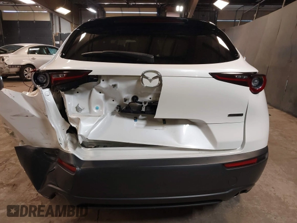 2021 Mazda CX-30 Preferred z VIN 3MVDMBCL2MM210902, wystawiony jako IAAI lot #42522203 z przebiegiem 42 995 mil mil oraz . Historia ofert i sprzedaży dostępna na DreamBid. Obrazek 17.