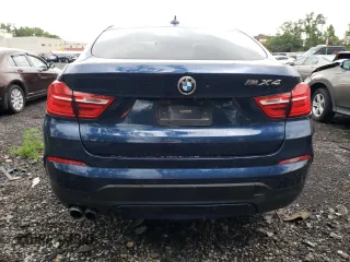 2016 BMW X4 xDrive28i with VIN 5UXXW3C50G0R22203, listed as a Copart auction lot 58575493 with 106,956 mi miles. Bid and sale history available at carsss.com. Image 6.