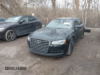 2015 Audi A8 L 4.0T with VIN WAU32AFD5FN026108, listed as a IAAI auction lot 41652860 with 148,253 mi miles. Bid and sale history available at carsss.com. Image 2.