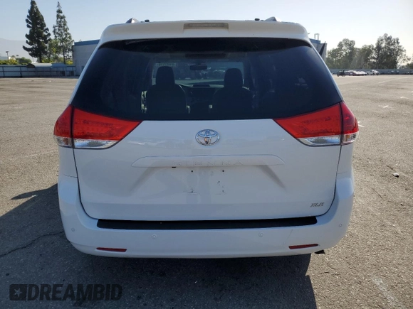 2013 Toyota Sienna XLE AAS with VIN 5TDYK3DC5DS322039, listed as a Copart auction lot 61657715 with 185,269 mi miles and Salvage title. Bid and sale history available at DreamBid. Image 6.