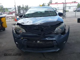 2016 Toyota Corolla L with VIN 2T1BURHE9GC600792, listed as a IAAI auction lot 42032340 with 164,152 mi miles and . Bid and sale history available at DreamBid. Image 6.