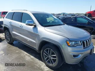 2018 Jeep Grand Cherokee Limited z VIN 1C4RJEBG5JC514356, wystawiony jako IAAI lot #41987271 z przebiegiem 110 521 mil mil oraz . Historia ofert i sprzedaży dostępna na DreamBid. Obrazek 1.