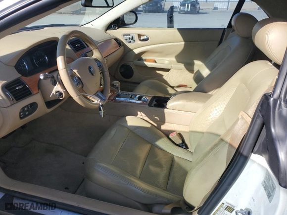 2009 Jaguar XK Series with VIN SAJWA44B895B27996, listed as a Copart auction lot 83377194 with NaN miles and Salvage Title. Bid and sale history available at carsss.com. Image 7.