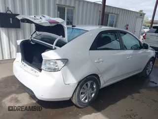2011 Kia Forte EX with VIN KNAFU4A25B5345288, listed as a IAAI auction lot 41936975 with 232,090 mi miles. Bid and sale history available at carsss.com. Image 4.