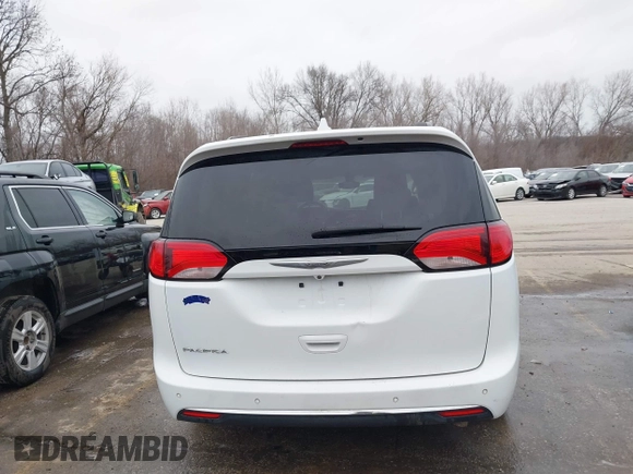 2017 Chrysler Pacifica Touring L with VIN 2C4RC1BG4HR583463, listed as a IAAI auction lot 41487599 with 180,459 mi miles and . Bid and sale history available at DreamBid. Image 17.