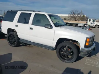 1997 GMC Yukon with VIN 1GKEK13R9VJ741768, listed as a IAAI auction lot 41692027 with 200,681 mi miles. Bid and sale history available at carsss.com. Image 1.