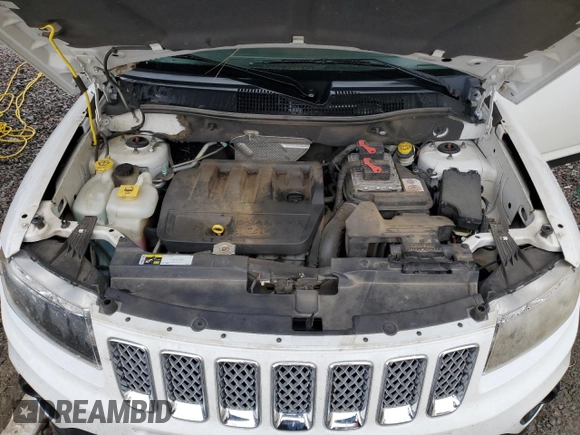2014 Jeep Compass Latitude with VIN 1C4NJCEB6ED659912, listed as a Copart auction lot 84479464 with 187,311 mi miles and Salvage Title. Bid and sale history available at carsss.com. Image 14.