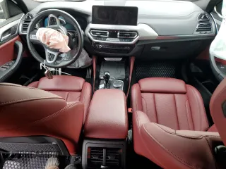 2022 BMW X4 xDrive30i z VIN 5UX33DT02N9J01520, wystawiony jako Copart lot #51488055 z przebiegiem Nie podano mil oraz Szkoda całkowita • Salvage title. Historia ofert i sprzedaży dostępna na DreamBid. Obrazek 8.
