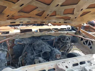 2018 GMC Sierra 2500HD Denali z VIN 1GT12UEG7JF169961, wystawiony jako IAAI lot #37206408 z przebiegiem Nie podano mil oraz . Historia ofert i sprzedaży dostępna na DreamBid. Obrazek 10.