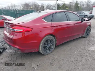 2018 Ford Fusion SE with VIN 3FA6P0HD8JR256214, listed as a IAAI auction lot 41147325 with 71,038 mi miles and . Bid and sale history available at DreamBid. Image 4.