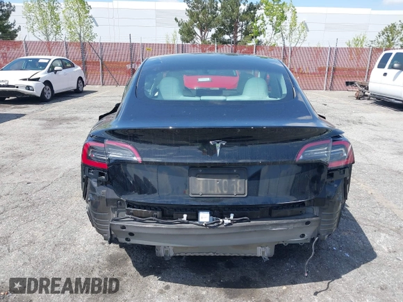 2022 Tesla Model 3 with VIN 5YJ3E1EA4NF316127, listed as a IAAI auction lot 41939191 with 30,857 mi miles. Bid and sale history available at carsss.com. Image 16.