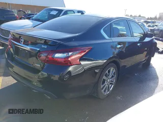 2018 Nissan Altima SR with VIN 1N4AL3AP4JC293173, listed as a IAAI auction lot 41079793 with 95,390 mi miles and . Bid and sale history available at carsss.com. Image 4.