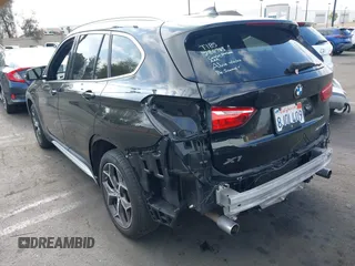 2019 BMW X1 sDrive28i with VIN WBXHU7C59K5L12320, listed as a IAAI auction lot 42116860 with 28,183 mi miles and . Bid and sale history available at DreamBid. Image 3.
