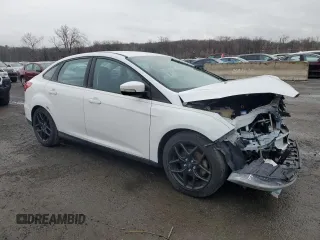 2016 Ford Focus SE z VIN 1FADP3F2XGL223796, wystawiony jako Copart lot #52567505 z przebiegiem Nie podano mil oraz Szkoda całkowita • Salvage title. Historia ofert i sprzedaży dostępna na DreamBid. Obrazek 4.