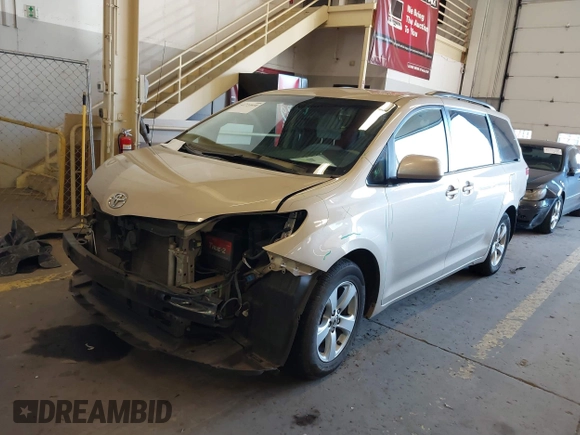 2013 Toyota Sienna LE AAS with VIN 5TDKK3DC8DS359172, listed as a IAAI auction lot 41724930 with 106,488 mi miles. Bid and sale history available at carsss.com. Image 2.