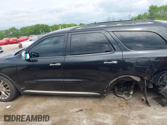 2014 Dodge Durango Citadel with VIN 1C4RDJEGXEC524883, listed as a IAAI auction lot 42357919 with 205,100 mi miles and . Bid and sale history available at DreamBid. Image 15.