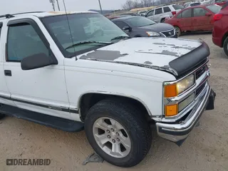 1997 Chevrolet Tahoe with VIN 1GNEK13R4VJ361515, listed as a IAAI auction lot 41768386 with 216,974 mi miles. Bid and sale history available at carsss.com. Image 13.