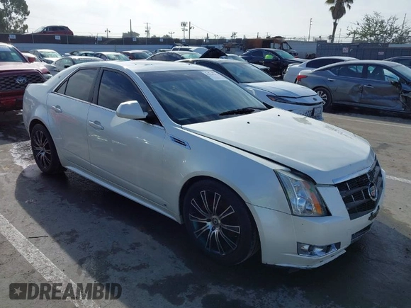 2010 Cadillac CTS with VIN 1G6DK5EVXA0102844, listed as a IAAI auction lot 41818267 with 127,517 mi miles and . Bid and sale history available at DreamBid. Image 1.