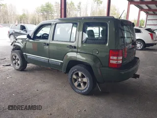 2008 Jeep Liberty Sport with VIN 1J8GN28K98W232003, listed as a IAAI auction lot 42127476 with 129,286 mi miles. Bid and sale history available at carsss.com. Image 3.