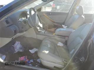 2003 Infiniti G35 w/Leather z VIN JNKCV51E23M015424, wystawiony jako Copart lot #87714105 z przebiegiem 174 773 mil mil oraz Szkoda całkowita • Salvage title. Historia ofert i sprzedaży dostępna na DreamBid. Obrazek 7.
