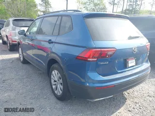 2018 Volkswagen Tiguan S with VIN 3VV0B7AXXJM018455, listed as a IAAI auction lot 41979115 with 92,104 mi miles. Bid and sale history available at carsss.com. Image 3.