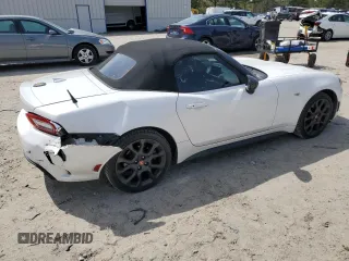 2017 FIAT 124 Spider Lusso z VIN JC1NFAEK0H0116019, wystawiony jako Copart lot #51153275 z przebiegiem 41 415 mil mil oraz Szkoda całkowita • Salvage title. Historia ofert i sprzedaży dostępna na DreamBid. Obrazek 3.