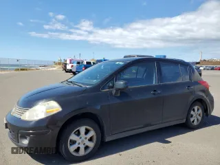 2009 Nissan Versa 1.8 SL with VIN 3N1BC13E49L407318, listed as a Copart auction lot 42192365 with 158,993 mi miles and Salvage Title. Bid and sale history available at carsss.com. Image 1.