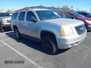 2007 GMC Yukon z VIN 1GKEC13J87J122444, wystawiony jako IAAI lot #41648344 z przebiegiem 151 319 mil mil oraz . Historia ofert i sprzedaży dostępna na DreamBid. Obrazek 1.