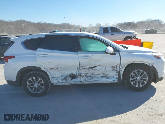 2019 Hyundai Santa Fe SE with VIN 5NMS2CAD4KH118545, listed as a IAAI auction lot 41686797 with 54,108 mi miles and . Bid and sale history available at DreamBid. Image 13.