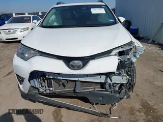 2018 Toyota RAV4 XLE with VIN JTMWFREV7JJ728184, listed as a IAAI auction lot 41377413 with 117,957 mi miles. Bid and sale history available at carsss.com. Image 6.