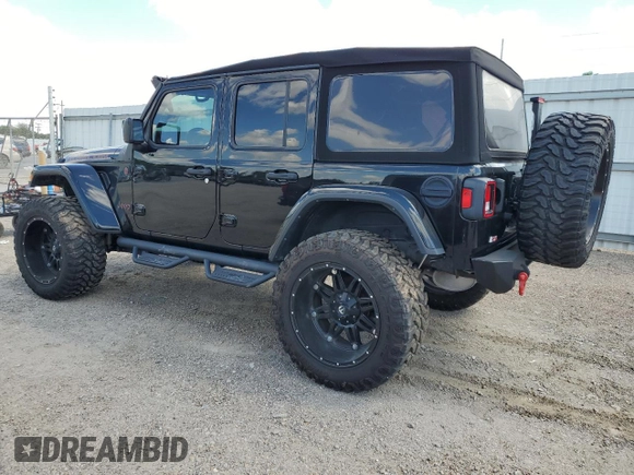 2023 Jeep Wrangler Rubicon with VIN 1C4HJXFG3PW682375, listed as a Copart auction lot 73969434 with Not provided miles and Salvage title. Bid and sale history available at DreamBid. Image 2.