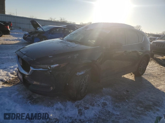 2021 Mazda CX-5 Touring with VIN JM3KFACM2M0329646, listed as a Copart auction lot 88217245 with 46,864 mi miles and Salvage Title. Bid and sale history available at carsss.com. Image 1.