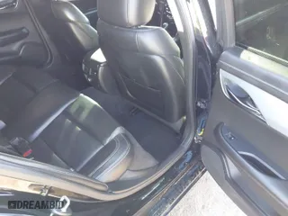 2015 Cadillac ATS Luxury with VIN 1G6AB5S39F0132415, listed as a IAAI auction lot 41348641 with 144,447 mi miles. Bid and sale history available at carsss.com. Image 8.