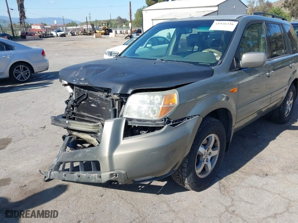 2007 Honda Pilot EX-L with VIN 5FNYF28727B041336, listed as a IAAI auction lot 41926326 with 102,927 mi miles. Bid and sale history available at carsss.com. Image 12.