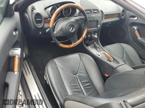 2010 Mercedes-Benz SLK with VIN WDBWK5JA7AF228325, listed as a Copart auction lot 55966235 with 41,728 mi miles and Salvage title. Bid and sale history available at DreamBid. Image 8.