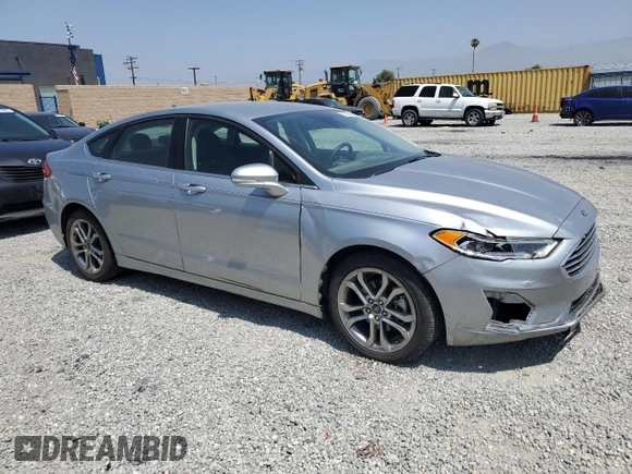2020 Ford Fusion SEL z VIN 3FA6P0CD3LR196210, wystawiony jako Copart lot #60240925 z przebiegiem 81 768 mil mil oraz Szkoda całkowita • Salvage title. Historia ofert i sprzedaży dostępna na DreamBid. Obrazek 4.