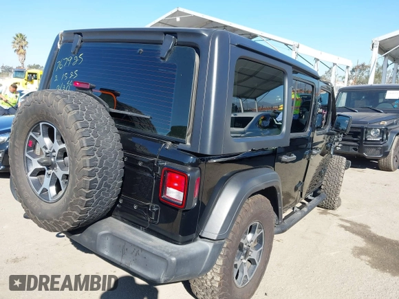 2023 Jeep Wrangler Willys with VIN 1C4HJXDN0PW597768, listed as a IAAI auction lot 41645815 with 23,717 mi miles and . Bid and sale history available at DreamBid. Image 4.