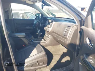 2016 GMC Canyon 4WD SLE with VIN 1GTG6CE30G1381435, listed as a IAAI auction lot 41642964 with 130,490 mi miles. Bid and sale history available at carsss.com. Image 5.