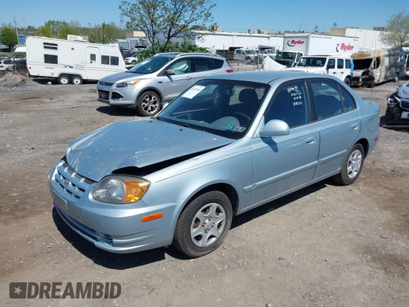2005 Hyundai Accent GLS with VIN KMHCG45C75U658672, listed as a IAAI auction lot 42107140 with 34,351 mi miles. Bid and sale history available at carsss.com. Image 2.