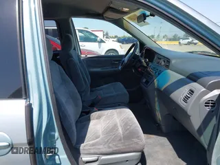 2003 Honda Odyssey EX with VIN 2HKRL18633H502246, listed as a IAAI auction lot 42414427 with 251,759 mi miles and . Bid and sale history available at DreamBid. Image 5.