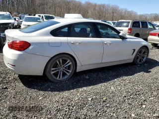 2015 BMW 4 Series 428i z VIN WBA4A9C53FGL85500, wystawiony jako Copart lot #50004575 z przebiegiem 129 018 mil mil oraz Szkoda całkowita • Salvage title. Historia ofert i sprzedaży dostępna na DreamBid. Obrazek 3.