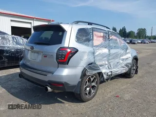 2015 Subaru Forester XT Touring with VIN JF2SJGWC1FH571301, listed as a IAAI auction lot 41682258 with 51,505 mi miles and . Bid and sale history available at DreamBid. Image 4.