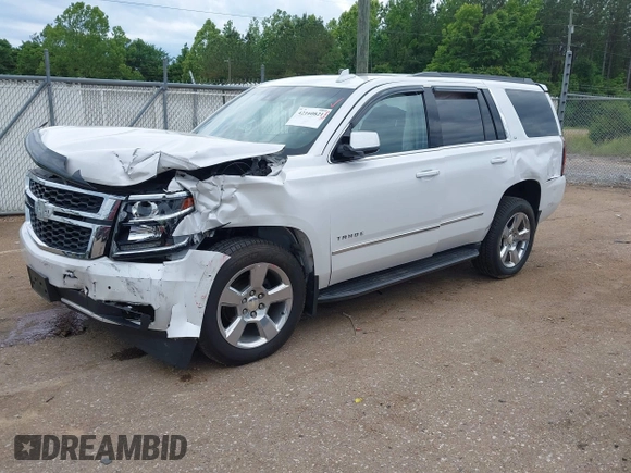 2020 Chevrolet Tahoe LT with VIN 1GNSCBKC4LR181887, listed as a IAAI auction lot 42160821 with 106,757 mi miles and . Bid and sale history available at DreamBid. Image 2.