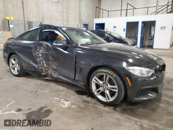 2015 BMW 4 Series 428i xDrive z VIN WBA3N9C56FK246152, wystawiony jako Copart lot #88752565 z przebiegiem 56 233 mil mil oraz Szkoda całkowita • Salvage title. Historia ofert i sprzedaży dostępna na DreamBid. Obrazek 4.