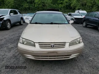 1997 Toyota Camry LE z VIN 4T1BG22K3VU819353, wystawiony jako Copart lot #58141275 z przebiegiem 32 935 mil mil oraz Czysty tytuł • Clean title. Historia ofert i sprzedaży dostępna na DreamBid. Obrazek 5.