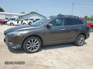 2015 Mazda CX-9 Grand Touring z VIN JM3TB2DA9F0468539, wystawiony jako Copart lot #60829905 z przebiegiem 223 483 mil mil oraz Czysty tytuł • Clean title. Historia ofert i sprzedaży dostępna na DreamBid. Obrazek 1.