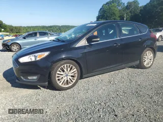 2017 Ford Focus Titanium with VIN 1FADP3N24HL291417, listed as a Copart auction lot 60871265 with 117,317 mi miles and Salvage title. Bid and sale history available at DreamBid. Image 1.